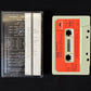 CURE - CONCERT (THE CURE LIVE) AND CURIOSITY (CURE ANOMALIES 1977-1984) (USED CASSETTE 1984 NETHERLANDS)