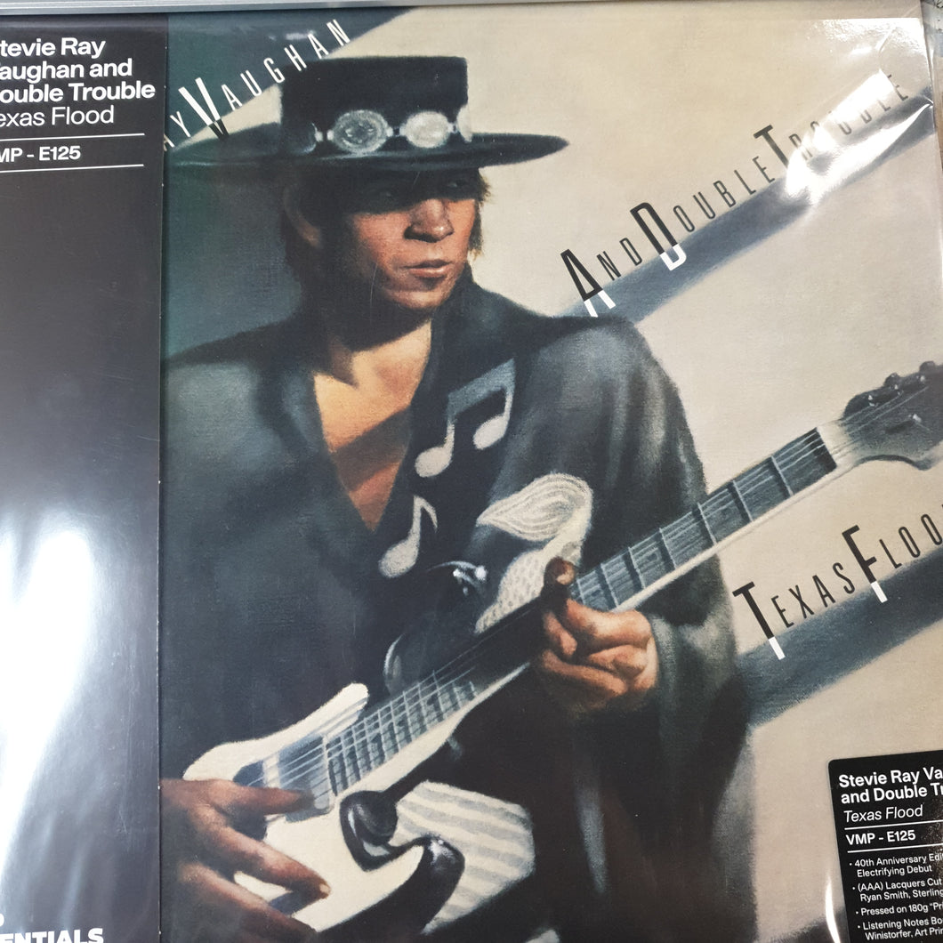 STEVIE RAY VAUGHAN & DOUBLE TROUBLE - TEXAS FLOOD (BLACK AND WHITE COLOURED) (VINYL ME PLEASE PRESSING) VINYL