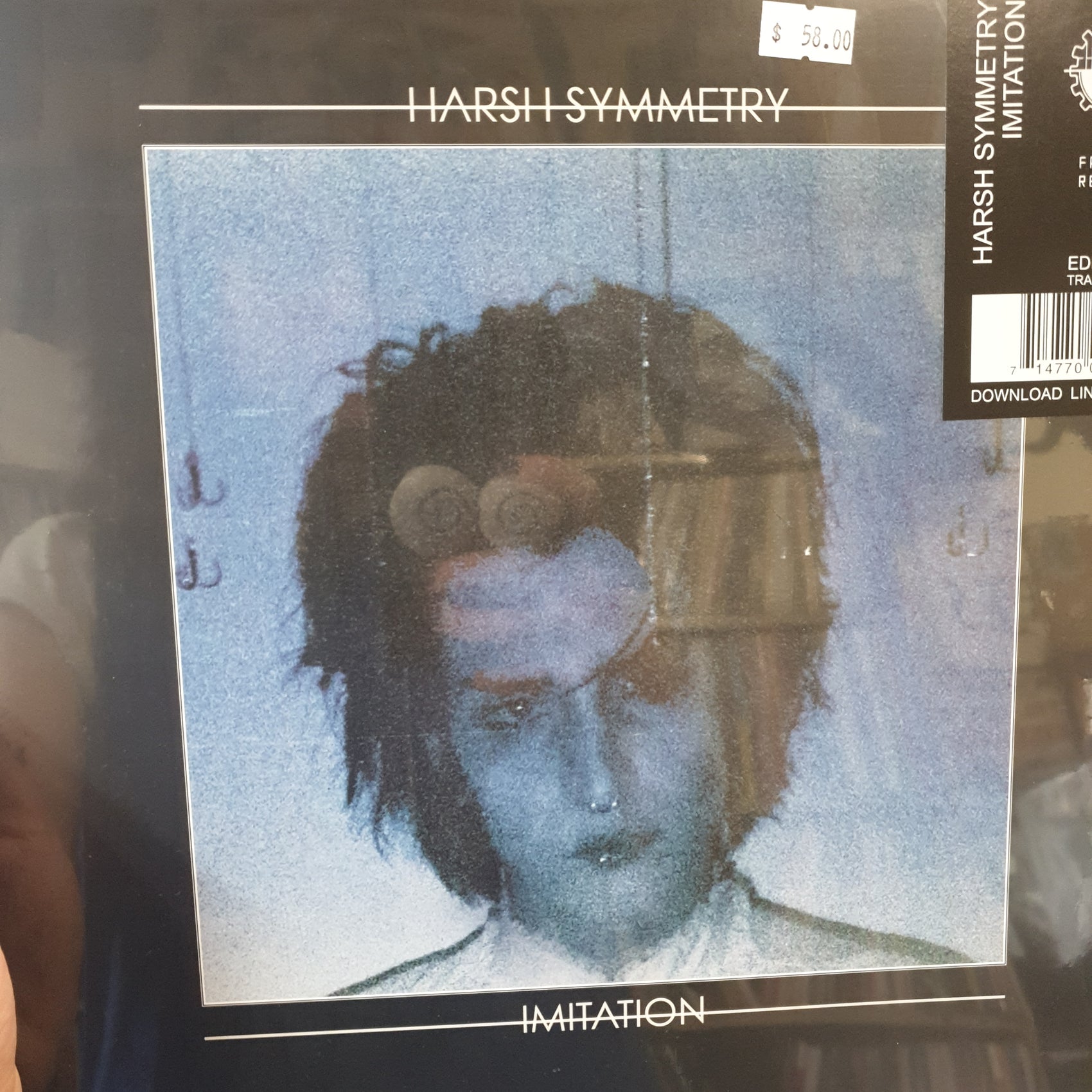 HARSH SYMMETRY - IMITATION (TRANSPARENT BLUE COLOURED) VINYL
