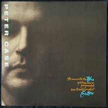 Load image into Gallery viewer, PETER CASE - THE MAN WITH THE POST MODERN FRAGMENTED NEO-TRADITIONALIST GUITAR (USED VINYL 1989 US M-/EX+)
