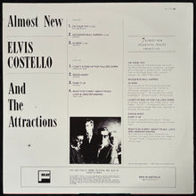 Load image into Gallery viewer, ELVIS COSTELLO AND THE ATTRACTIONS - ALMOST NEW (MLP) (USED VINYL 1982 AUS M-/M-)
