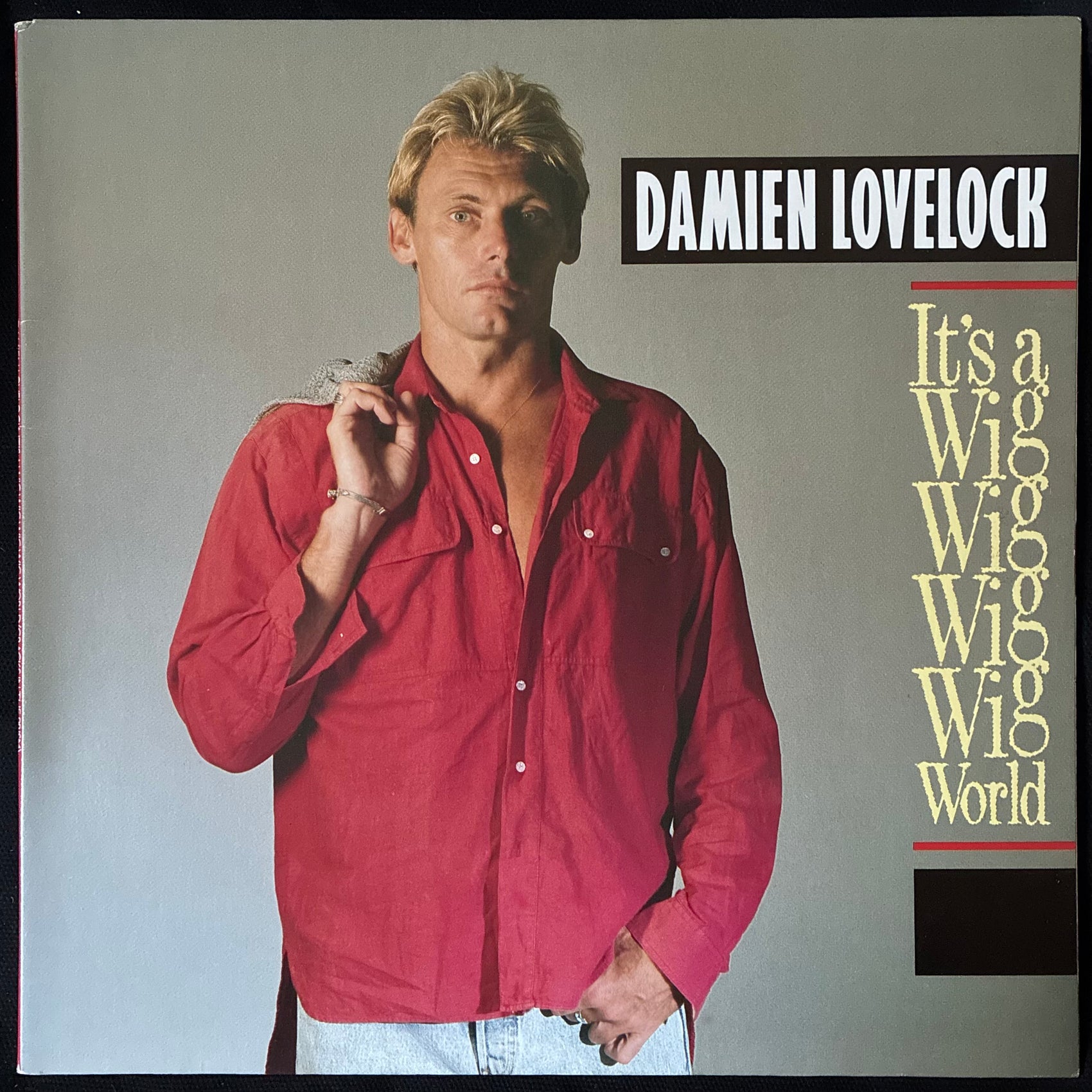 DAMIEN LOVELOCK - IT'S A WIG WIG WIG WIG WORLD (USED VINYL 1988 AUS M-/EX+)