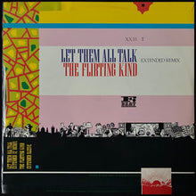 Load image into Gallery viewer, ELVIS COSTELLO AND THE ATTRACTIONS - LET THEM ALL TALK : EXTENDED REMIX (12") (USED VINYL 1983 UK M-/M-)
