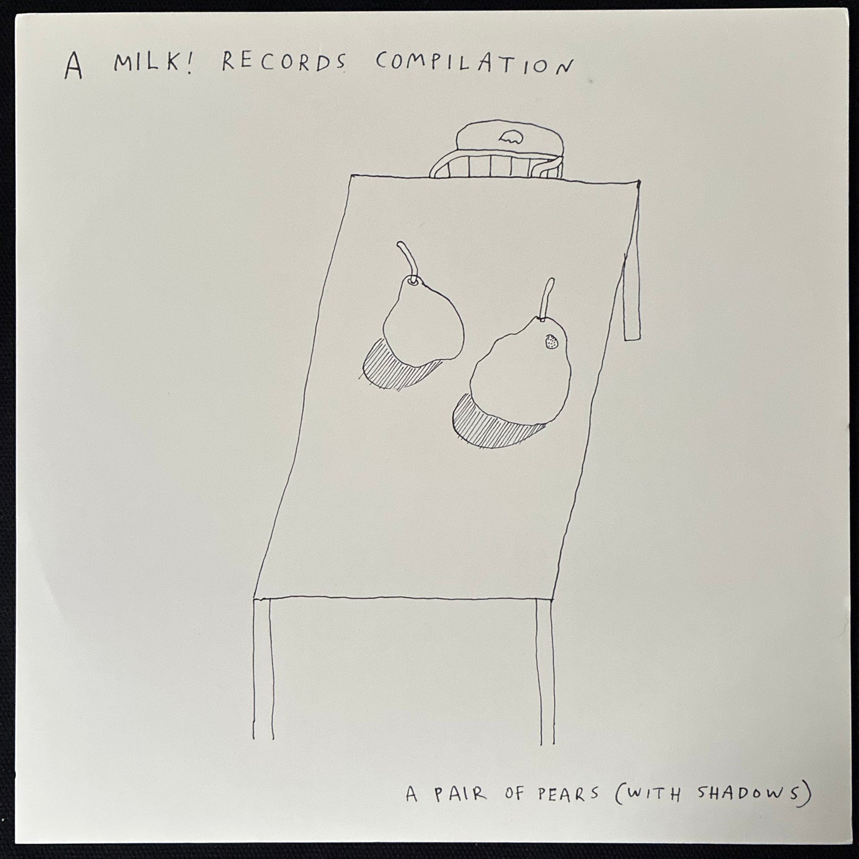 VARIOUS ARTISTS - A PEAR OF PAIRS (WITH SHADOWS) A MILK! RECORDS COMPILATION (10") (WHITE COLOURED) (USED VINYL 2014 AUS M-/M-)