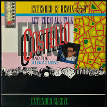 Load image into Gallery viewer, ELVIS COSTELLO AND THE ATTRACTIONS - LET THEM ALL TALK : EXTENDED REMIX (12") (USED VINYL 1983 UK M-/M-)
