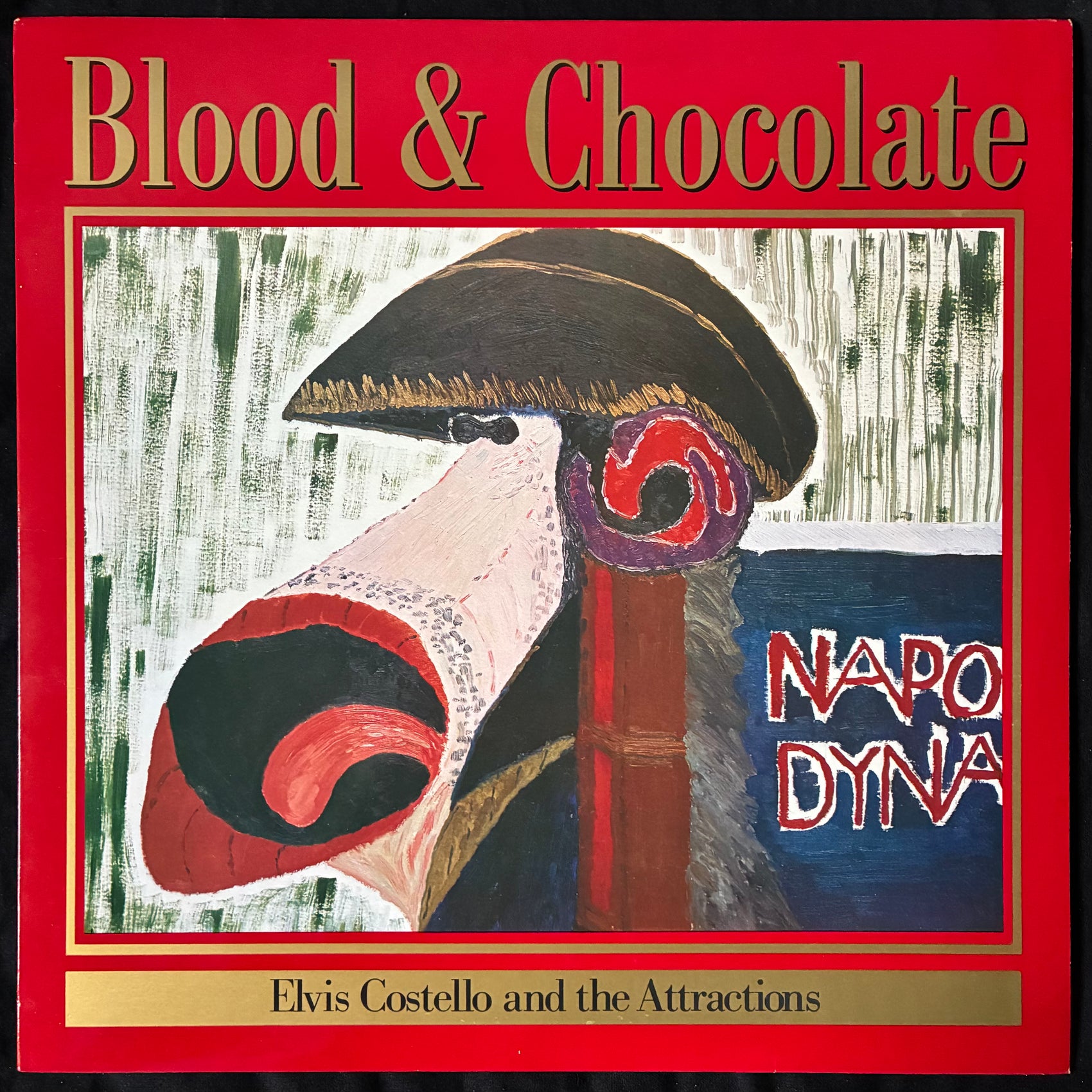ELVIS COSTELLO AND THE ATTRACTIONS - BLOOD & CHOCOLATE (USED VINYL 1986 UK M-/M-)
