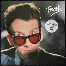 Load image into Gallery viewer, ELVIS COSTELLO AND THE ATTRACTIONS - TRUST (USED VINYL 1984 UK M-/M-)
