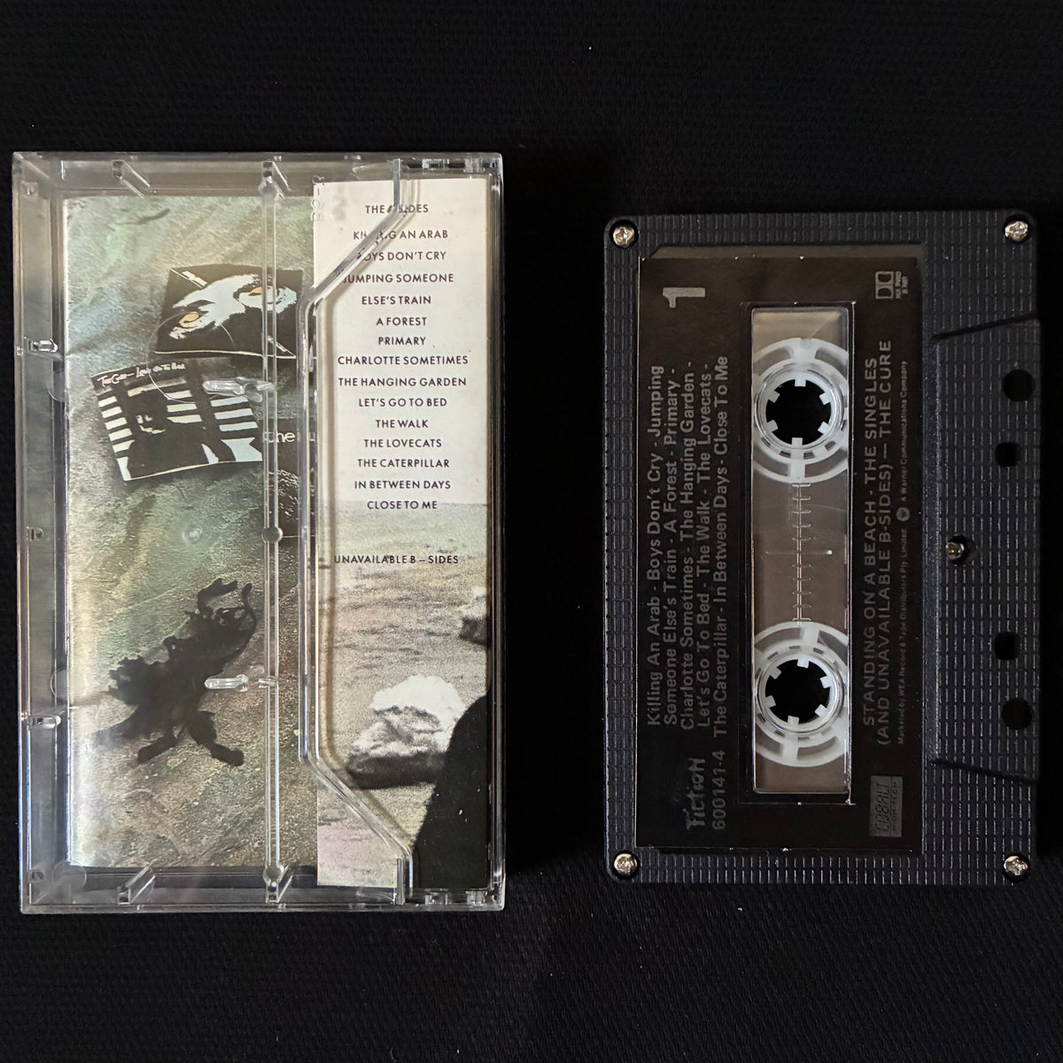 CURE - STANDING ON A BEACH : THE SINGLES (AND UNAVAILABLE B-SIDES) (USED CASSETTE 1986 AUS)