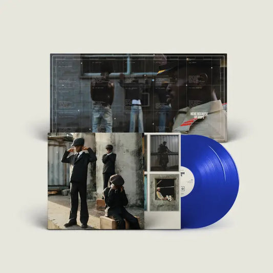 EZRA COLLECTIVE - HERE BECAUSE OF HOPE (2LP) (TRANSPARENT BLUE) VINYL