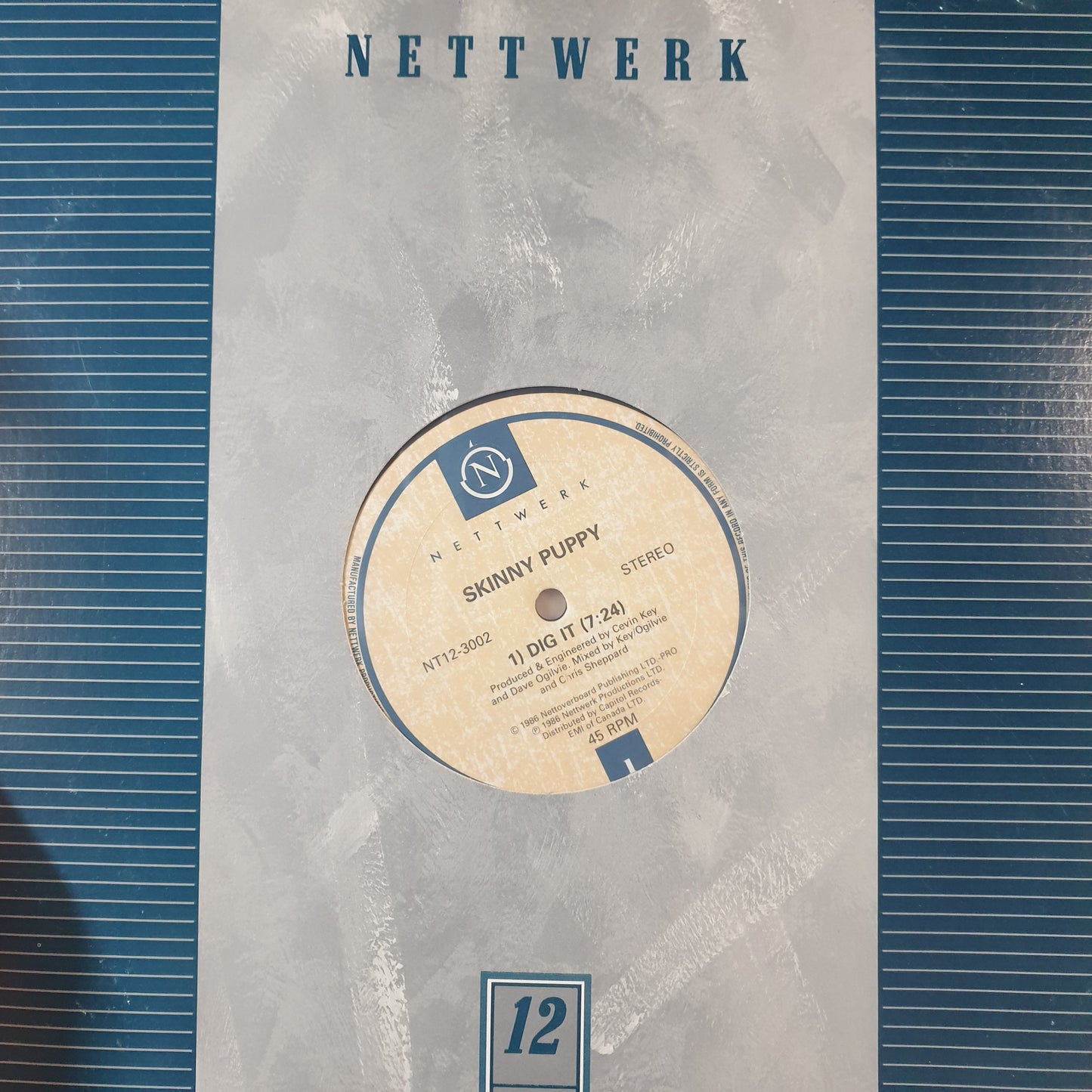 SKINNY PUPPY - DIG IT (12") (USED VINYL 1986 CANADIAN M-)