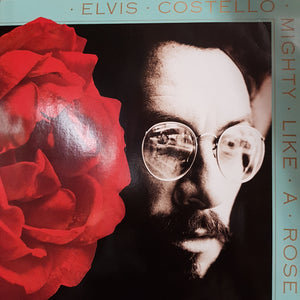 ELVIS COSTELLO - MIGHTY LIKE A ROSE (GOLD COLOURED) (USED VINYL 2022 EURO M-/M-)
