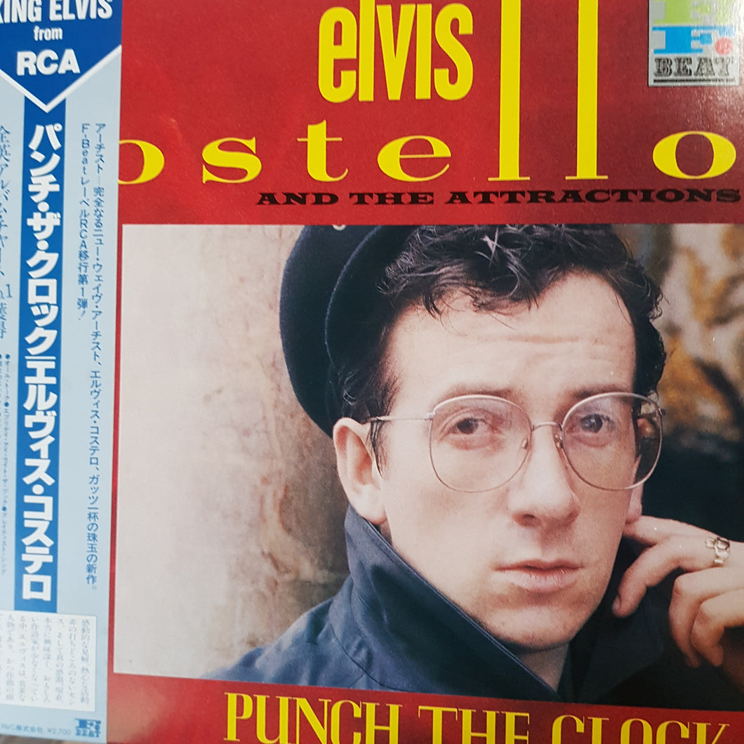 ELVIS COSTELLO - PUNCH THE CLOCKS (USED VINYL 1983 JAPANESE M-/M-)