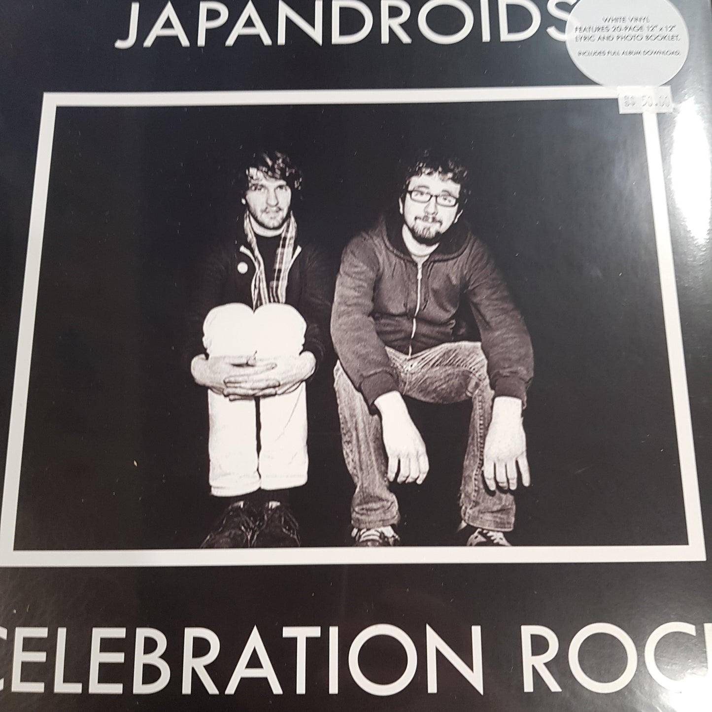 JAPANDROIDS - CELEBRATION ROCK (INCLUDES 20 PAGE BOOKLET) (WHITE COLOURED) VINYL