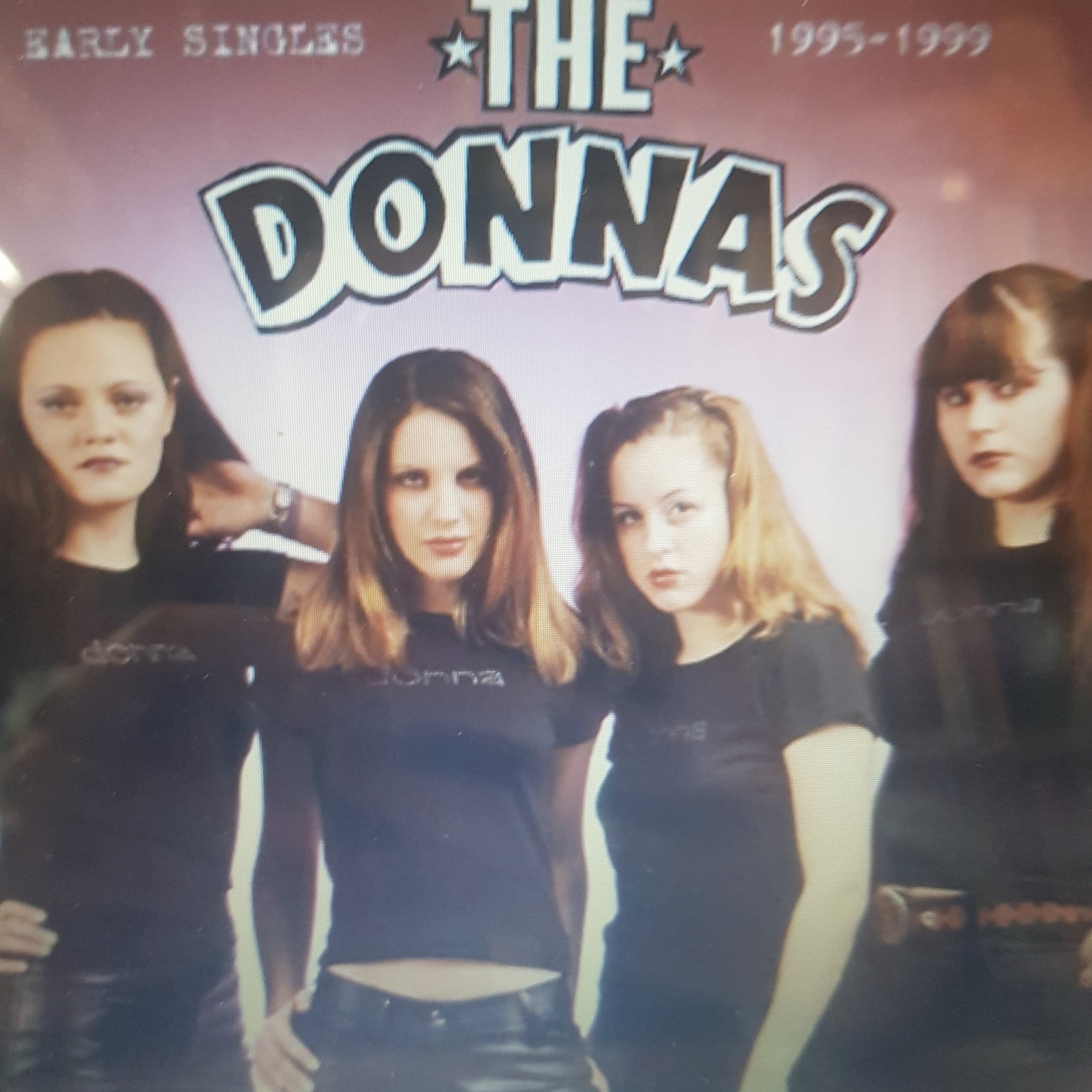 DONNAS - EARLY SINGLES 1995-1999 (COLOURED) VINYL
